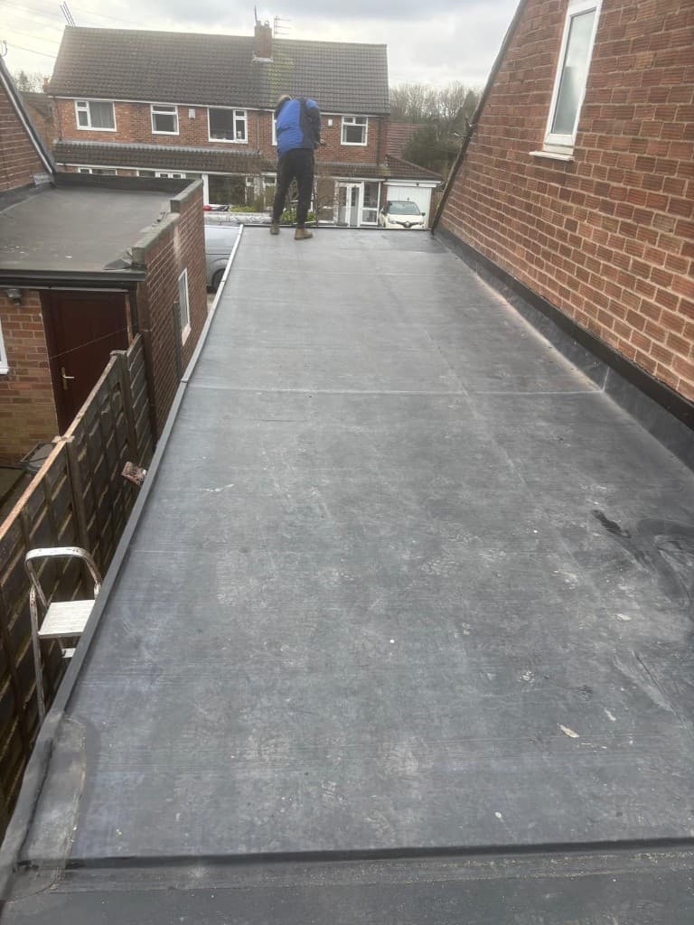 EPDM rubber flat roof installation with neat upstands on domestic extension Greater Manchester Cooper Roofcraft