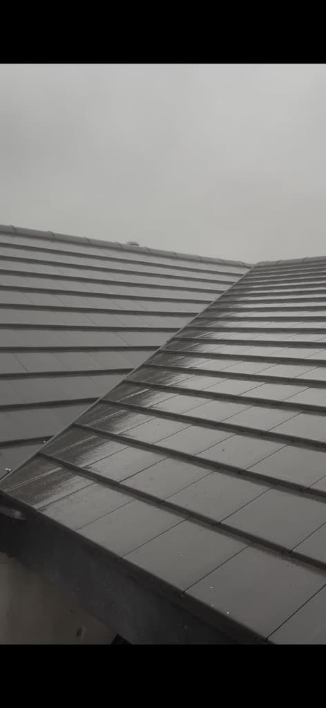 Completed domestic roof tiling project by Cooper Roofcraft