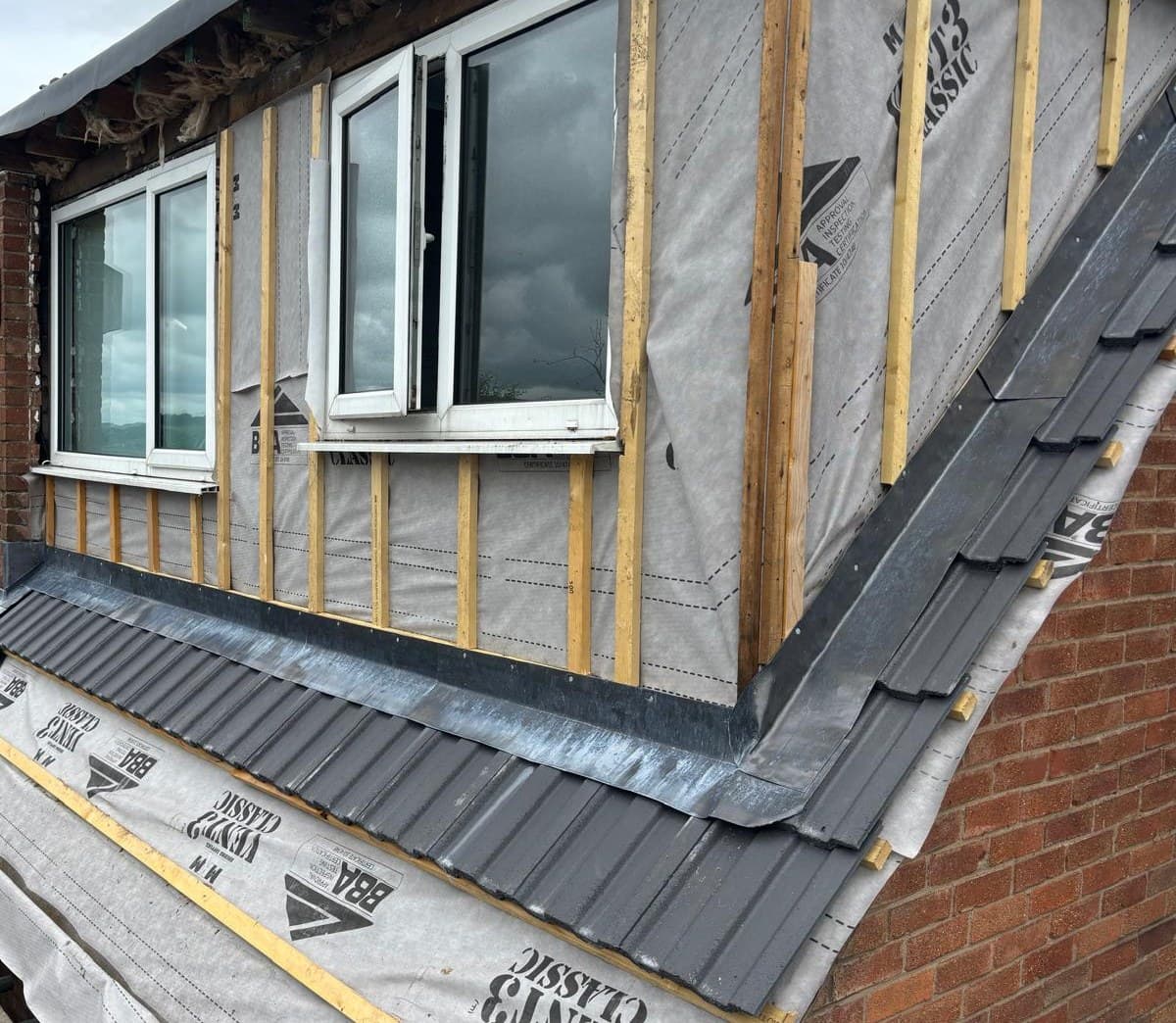 Dormer roofing with breathable membrane battens and lead detail by Cooper Roofcraft