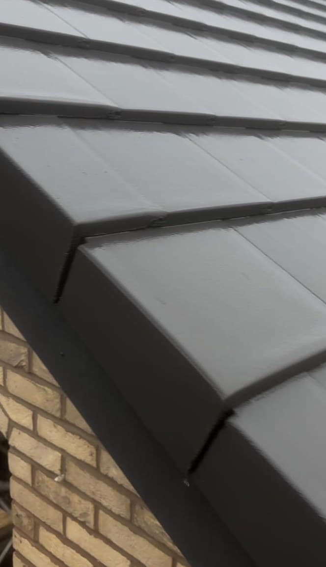 Dry verge and tiled roof detail, domestic roofing by Cooper Roofcraft, Bury and Greater Manchester