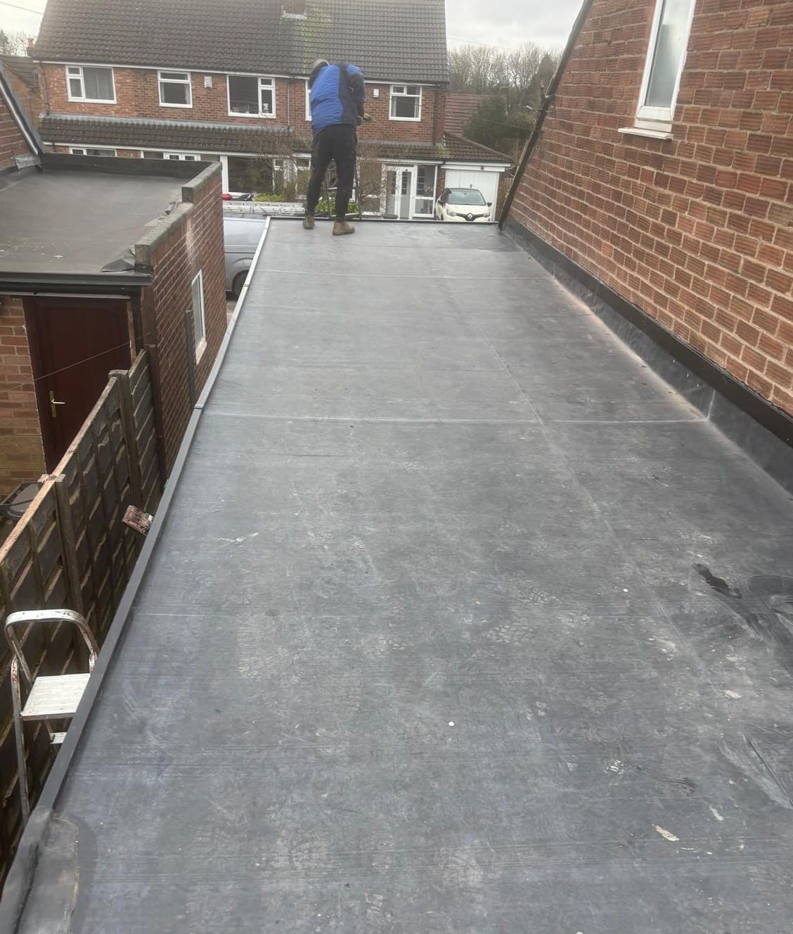 Large domestic flat roof EPDM style installation with professional trim Cooper Roofcraft Greater Manchester
