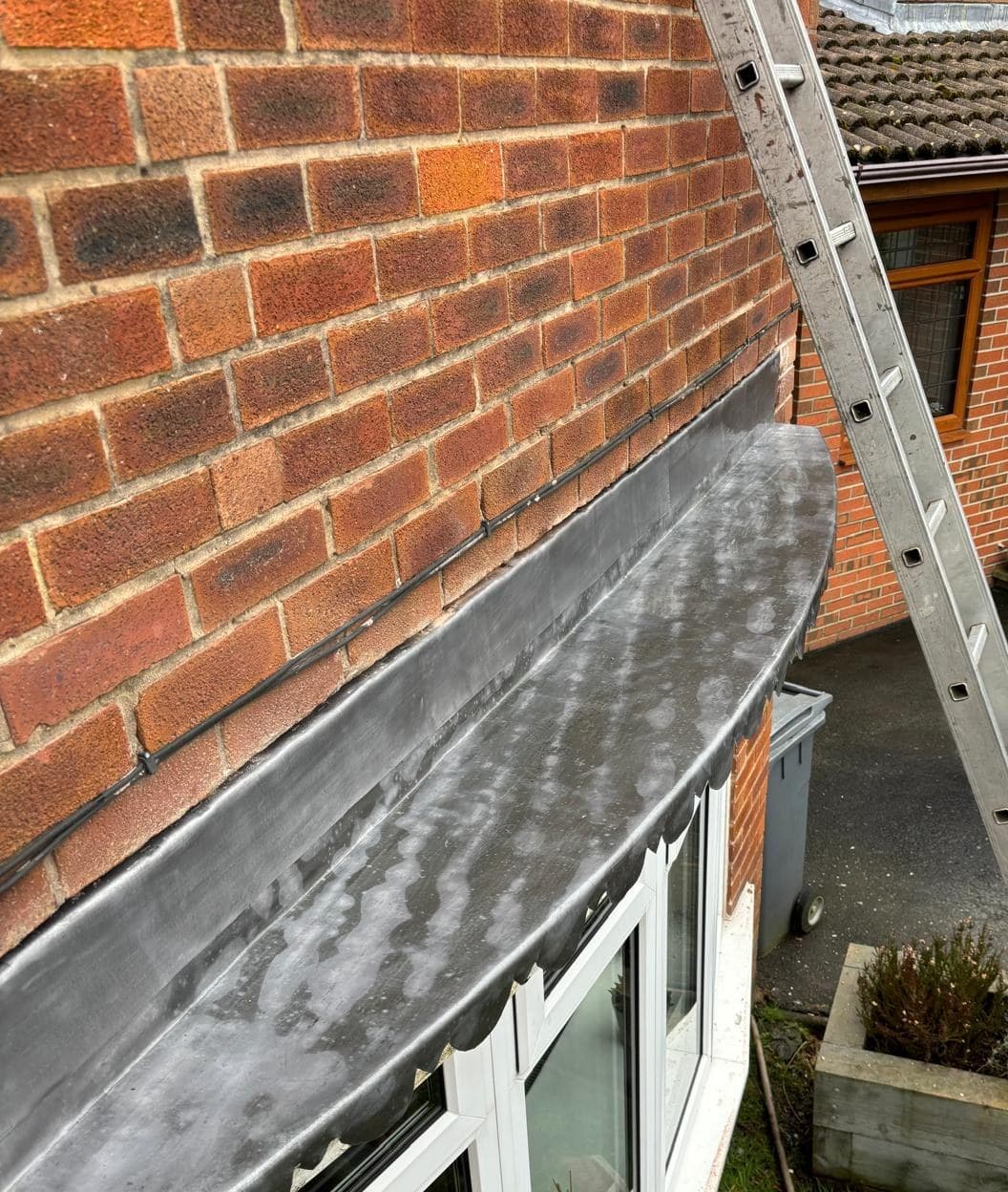Lead bay roof and flashing detail domestic roofing Cooper Roofcraft Greater Manchester