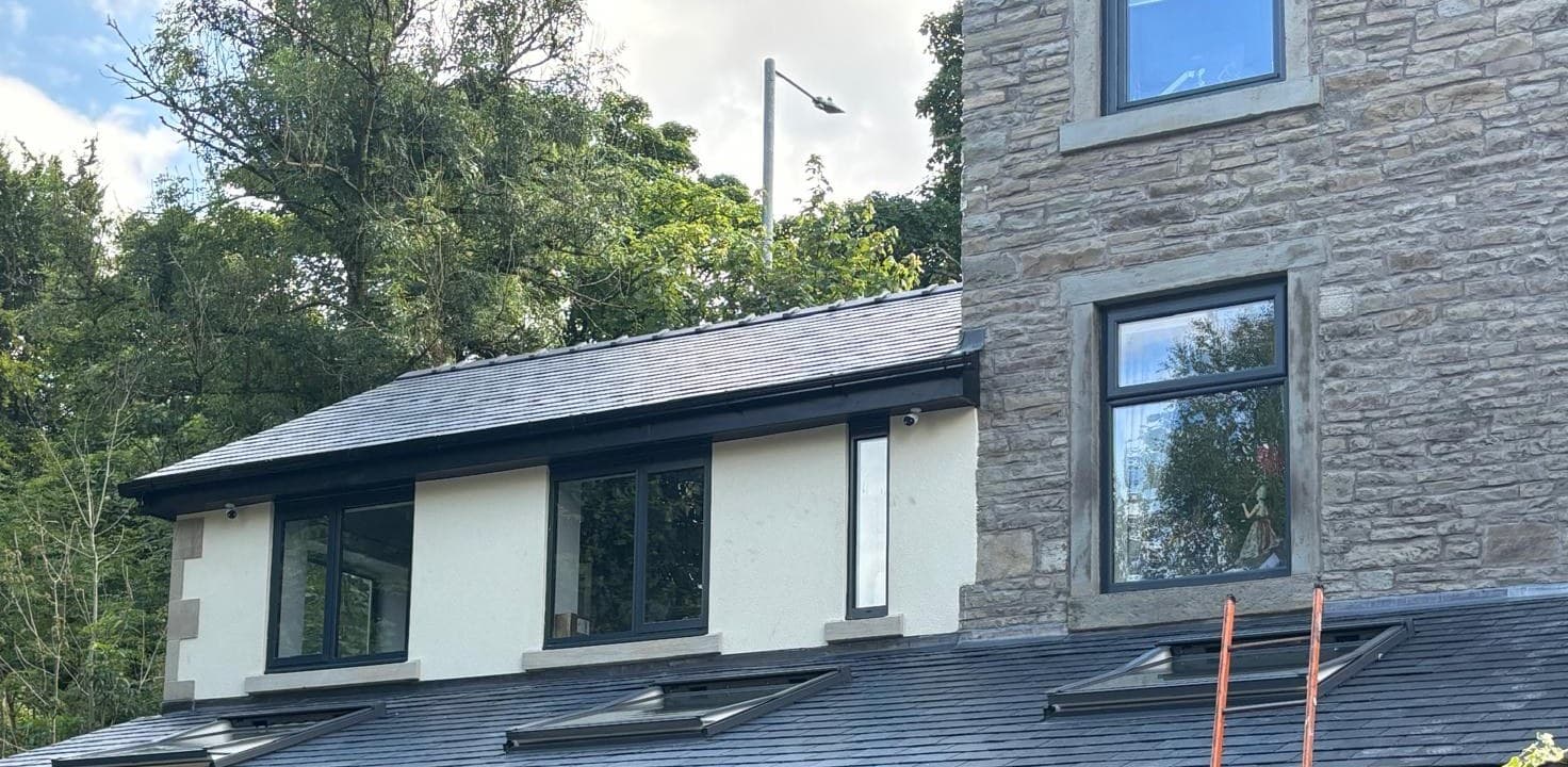 Slate roof and skylights on a domestic extension, roofing by Cooper Roofcraft, Bury and Greater Manchester